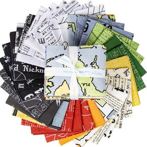 May include: A set of 20 fabric squares featuring a variety of vintage-inspired prints, including maps, numbers, and text. The fabric squares are arranged in a fan shape and tied together with a white ribbon.