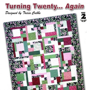 May include: A quilt pattern book titled "Turning Twenty... Again" designed by Tricia Cribbs. The book is the second in a series and features a colorful quilt design with pink, green, red, and white squares on a black background with a floral border.