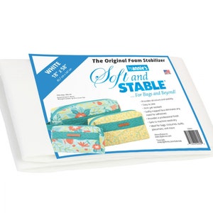 May include: White foam stabilizer sheet, 18 inches by 58 inches, by Annie's Soft and Stable. The packaging shows the product's use for bags and beyond. It provides structure and stability, is firm yet resilient, and is safe for machine washing.