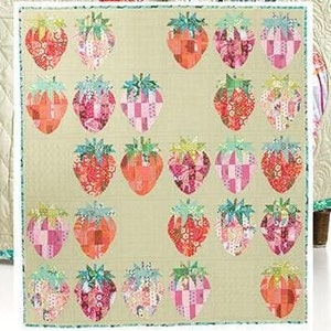 May include: A quilting pattern featuring a patchwork design of strawberries. The pattern is called "Mod Strawberries" and is a "QCR - mini - Pattern" #416.