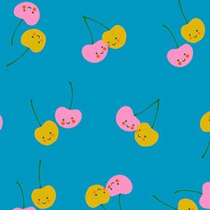 Peut inclure: Un tissu turquoise avec un motif répété de cerises souriantes. Les cerises sont par paires, une rose et une jaune, chacune avec une tige verte. Le texte "RUBY STAR SOCIETY" est en bas.