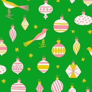 May include: Green fabric featuring a festive pattern of pink and white baubles, yellow stars, and yellow and pink birds. The baubles display diverse designs, including stripes, dots, and geometric shapes. The text "Am" and "elle" is visible.