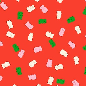 May include: Red fabric with a repeating pattern of gummy bear candies in green, pink, and white. The fabric has a ruler along the bottom with the text "RUBY STAR SOCIETY".
