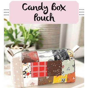 May include: A patchwork Candy Box Pouch with a zip closure. The pouch is made of various fabric squares in red, brown, white, and yellow. The finished size is 20cm w x 13cm h x 5cm d. The text "Candy Box Pouch" is at the top.