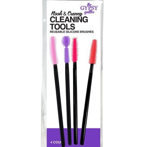 May include: A clear plastic package containing four reusable silicone cleaning brushes. The brushes have black handles and come in pink, purple, red, and orange. The package has text that reads "Nook & Cranny Cleaning Tools".