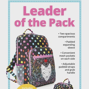 May include: Black backpack with colorful polka dots and a smaller matching backpack with a wolf design. Features include two compartments, a padded sleeve, mesh pockets, and adjustable straps. The text "Leader of the Pack" is displayed.