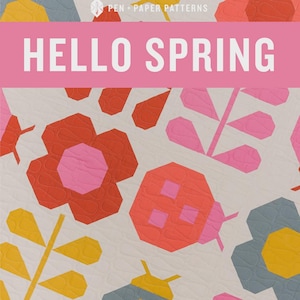 Peut inclure: Un modèle de courtepointe avec un motif coloré de coccinelles, de fleurs et de feuilles. Le motif est intitulé "Hello Spring" et est décrit comme un modèle de courtepointe traditionnellement assemblé pour les couturières débutantes avancées et plus.