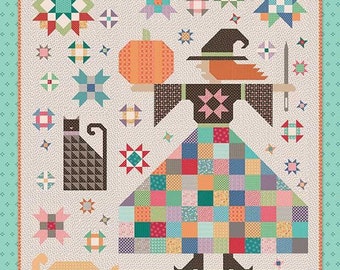 Könnte beinhalten: Ein farbenfrohes Quiltmuster mit einer Hexe mit einem Kürbis, einer schwarzen Katze und einem Besen. Der Quilt trägt den Titel "The Quilted Witch" und wurde von Lori Holt für Bee in my Bonnet Co. entworfen.