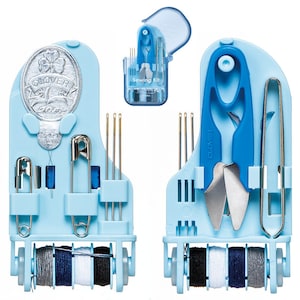 May include: A light blue plastic sewing kit containing silver needles, safety pins, a needle threader with a clover emblem, blue plastic-handled scissors, and a metal bodkin. The base features spools of black, white, navy, and grey thread.