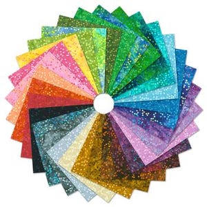 May include: A circular arrangement of colorful fabric squares, showcasing a spectrum of hues from pink and yellow to blue and green. Each square features a speckled pattern, creating a vibrant and textured display. Ideal for quilting and crafting projects.