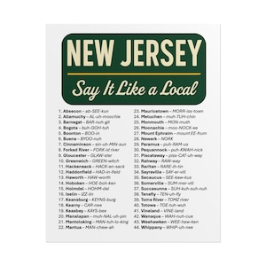 May include: A green and white sign with the words "NEW JERSEY" at the top and "Say It Like a Local" below. The sign lists 44 place names with phonetic pronunciations, such as "Absecon - ab-SEE-kun" and "Allamuchy - AL-uh-moochie".