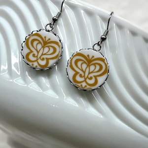 Boucles d&#39;oreilles rondes vintage cassées Corelle Butterfly Gold nostalgiques des années 70-80