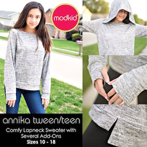 May include: A gray sweater with a mock neck and long sleeves. The sweater has a side slit and thumbholes. The text "modkid" and "annika tween/teen" is visible. The text "Comfy Lapneck Sweater with Several Add-Ons" and "Sizes 10-18" is also visible.