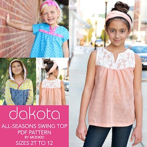 May include: A pink sleeveless top with a white lace trim neckline. The top has a gathered bodice and is made of a lightweight fabric. The model is wearing the top with blue jeans. The text "dakota ALL-SEASONS SWING TOP PDF PATTERN BY MODKID SIZES 2T TO 12" is displayed on a pink background.