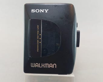 Lettore di cassette vintage Sony Walkman WM-EX10, registratore audio retrò funzionante.