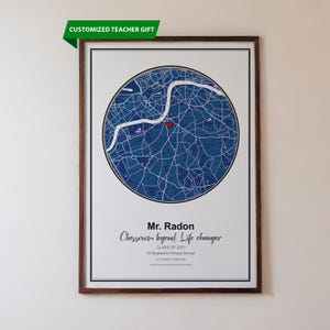 May include: A framed print featuring a blue map of a city, with a red marker. The text "CUSTOMIZED TEACHER GIFT" is at the top. Below the map, the text reads "Mr. Radon Classroom legend. Life changer".