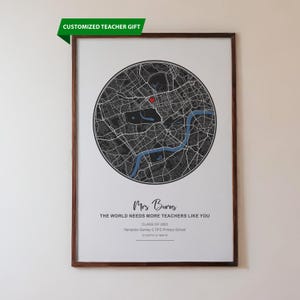 May include: Framed print with a map of a city, featuring a circular design with a river and roads. The print includes the text "CUSTOMIZED TEACHER GIFT" and a personalized message for Mrs. Burns, a teacher.