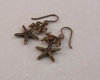 Niobium earrings, brown Niobium with Antique Brass starfish, hypoallergenic earrings by EarthsOpulence