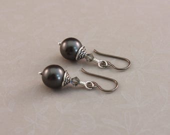 Niobium earrings, hypoallergenic pierced earrings with Black pearls and Lotus bead caps