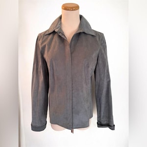 May include: A handmade wooden sign with the text "Welcome" in a playful font. The sign is painted white with a distressed finish, and features a small, decorative heart. It's designed for indoor or outdoor use.