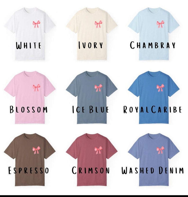 Pode incluir: Nove t-shirts de cores diferentes com um la&ccedil;o rosa na frente. As cores s&atilde;o branco, marfim, Chambray, flor, azul gelo, azul real, espresso, carmesim e denim lavado.