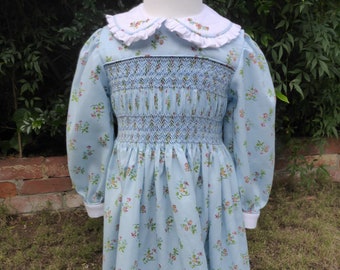 Size 12 Hand Smocked blue gingham dress with embroidered daisies