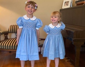 Size 2 and size 4 matching Hand Smocked Dresses