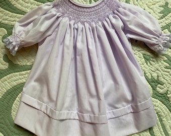 Size 6 months Hand Smocked mauve Bishop Yoke Dress with seed pearls.