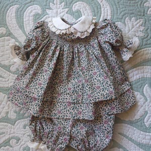 Size 1/2 Hand Smocked Round Yoke Dress with matching knickers.