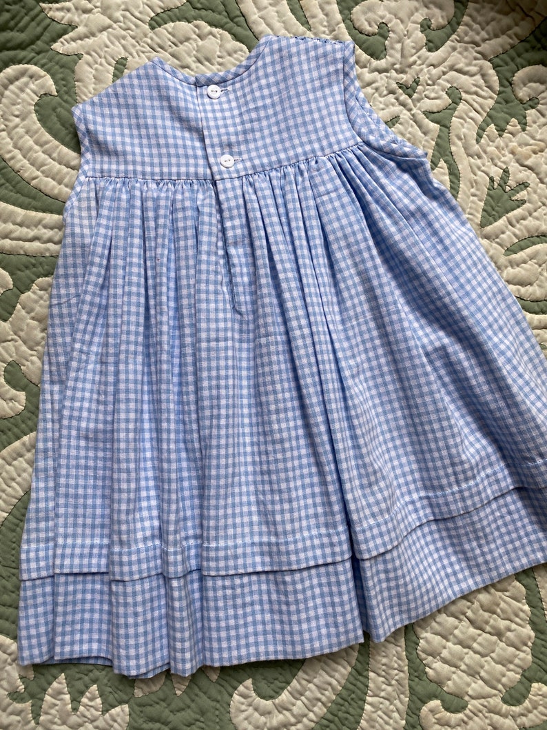 Size 12 Hand Smocked blue gingham dress with embroidered daisies