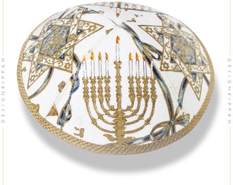 May include: White kippah with a gold menorah and blue and gold stars design.