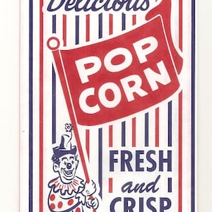 May include: A vintage popcorn bag with red and white stripes. The bag features a red banner with the words "POP CORN" in white letters. A clown with a red nose and polka dot clothing is holding a stick with a flower on top. The text "Delicious" is at the top of the bag and "Fresh and Crisp" is at the bottom.