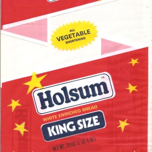 May include: A red and white package of Holsum White Enriched Bread, King Size. The package features the Holsum logo, yellow stars, and the text "All Vegetable Shortening". Net weight is 20 oz (1 lb 4 oz).