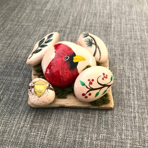 Red Cardinal Bird Painted Rocks on a Driftwood Nest