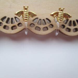 Tiny Gold Bee Invisible Clip On Earrings with Comfortable Clear Plastic Slide On Clips