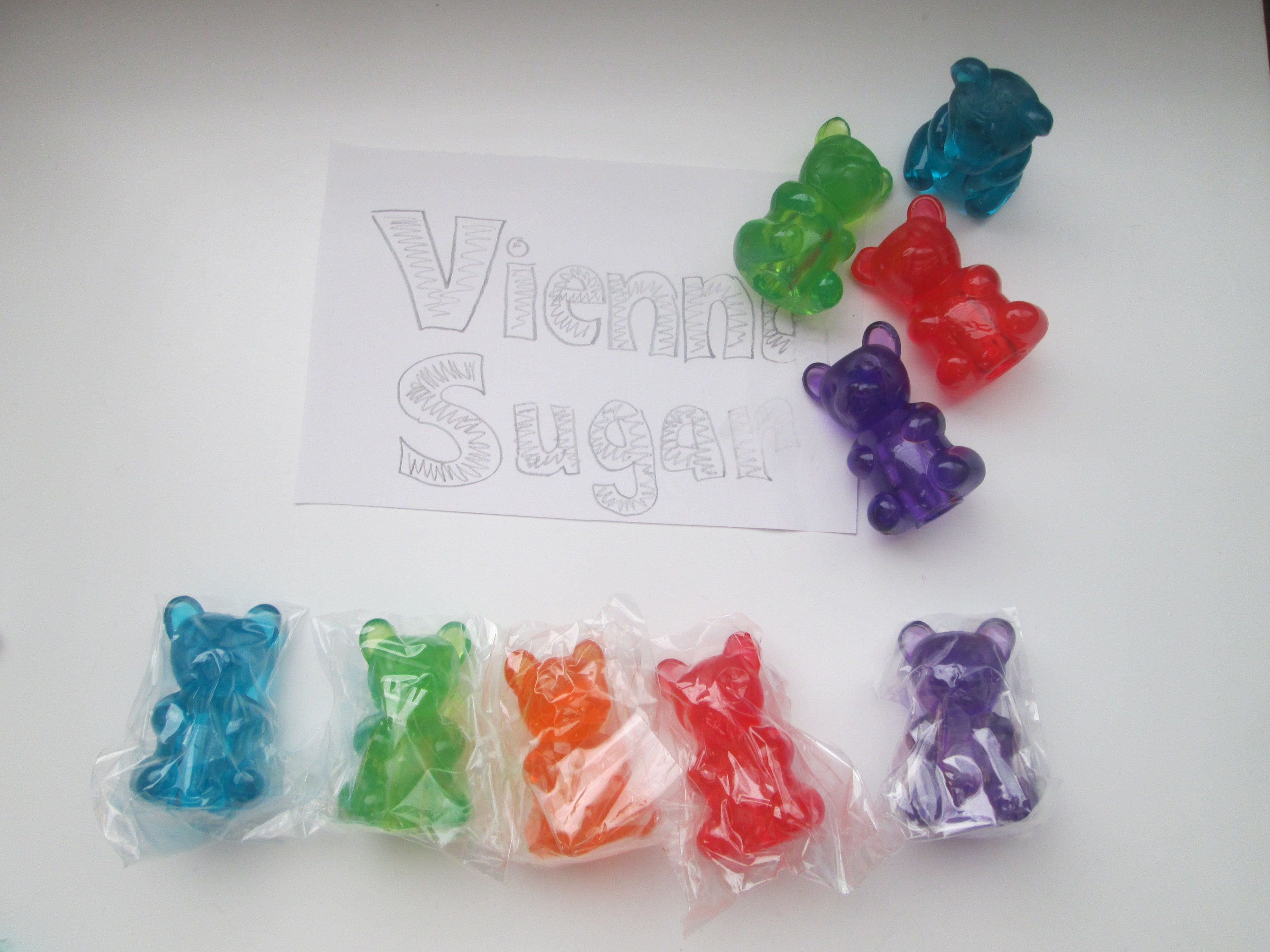 Hand drawn aesthetic cute green and orange gummy bears Stock