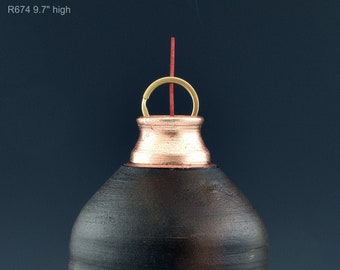 Handmade raku fired vessel. oimcsnse holder and burner copper matte and copper leaf M674