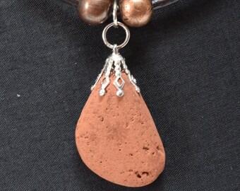 Beach brick pendant 5 with copper beads. 3mm leather cord with a stainless bayonet clasp. one of a kind.