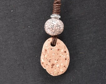 Cape Cod beach brick fragment, with leather, crackled clay bead and stainless bayonet clasp. BB7