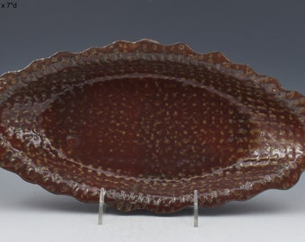 Oval handmade plate, scalloped edges, temmoku red brown glaze