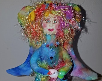 Enchanting fiber sculpted rainbow angel, silk face and Swarovski crystal accents