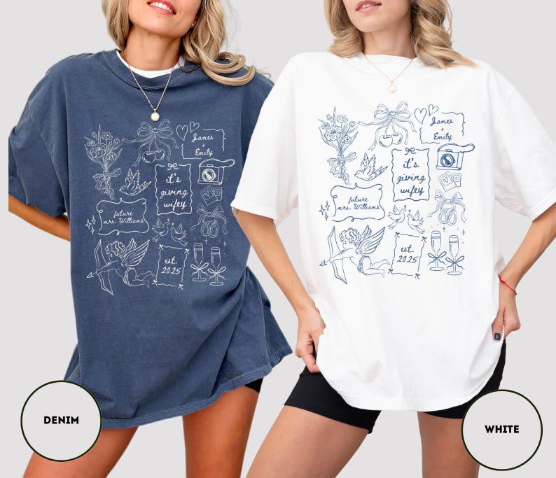 May include: Two oversized t-shirts, one denim blue and one white, featuring a whimsical doodle design in white and blue. The design includes text that says "it's giving wifey", "future mrs. Williams", and "est. 2025". The shirts are casual and comfortable.
