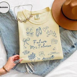 May include: A rustic wooden sign with the text "Welcome to our home" in white lettering. The sign features a distressed finish and a simple, inviting design, perfect for entryway decor.