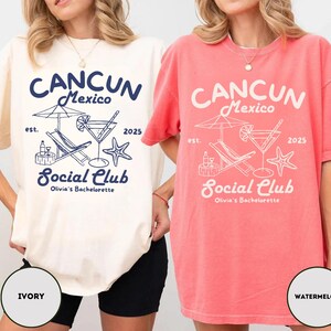 May include: Two women wearing t-shirts with a graphic design of a beach scene with a lounge chair, a cocktail, and a starfish. The text on the shirts reads "Cancun Mexico est. 2025 Social Club Olivia's Bachelorette". The shirts are available in ivory and watermelon.
