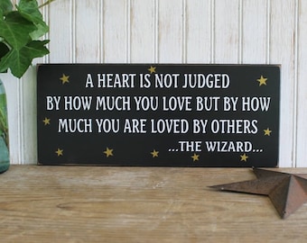 A Heart is not Judged Wizard Of Oz Wood Sign Inspirational Wall Art Plaque Tin Man Wizard of Oz Quote Signs with Sayings Tin Man Sign