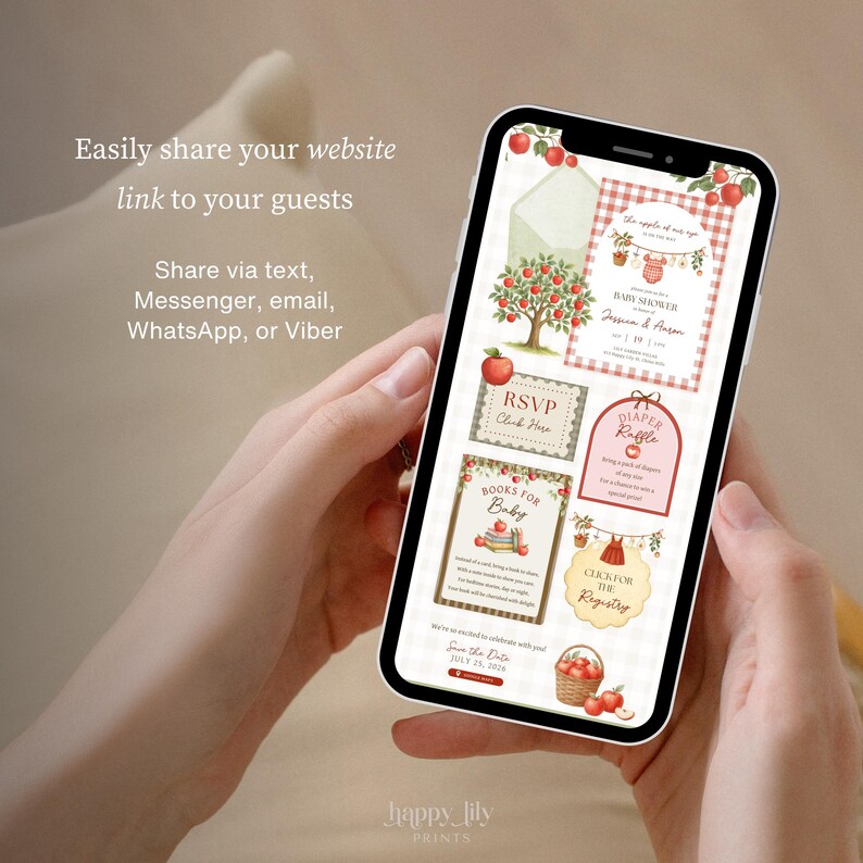May include: A smartphone screen displaying a digital baby shower invitation suite with an apple theme. The design features red apples, green leaves, and gingham patterns. Text includes "the apple of our eye," "BABY SHOWER," "RSVP," "DIAPER RAFFLE," and "BOOKS FOR BABY."