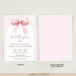 May include: Pink and white gingham patterned invitation with a pink bow on top. The text reads "Our little girl is One. Please join us to celebrate Isabella's 1st Birthday. Sat 28 Oct from 3 to 5 in the afternoon. Isabella's House 123 Happy Lily Lane, Seattle, WA. 92119. RSVP to Mom 123.456.7890. Front."