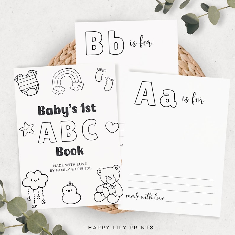 May include: A black and white printable baby's first ABC book with illustrations of a rainbow, footprints, a onesie, a cloud, a teddy bear, and a star. The text reads "Baby's 1st ABC Book" and "Made with love by family & friends".