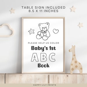 May include: Black and white printable sign featuring a teddy bear, a star, a heart, and the text "Please help us color Baby's 1st ABC Book". The sign is 8.5 inches by 11 inches.