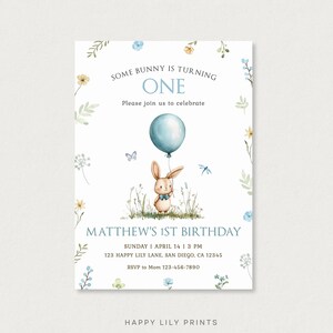 May include: A blue and white birthday invitation with a cute bunny holding a blue balloon. The invitation says "Some bunny is turning one" and includes the text "Matthew's 1st Birthday".